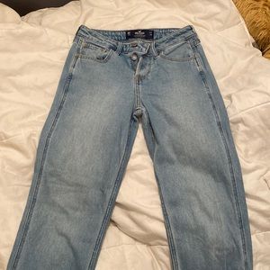 Low rise boyfriend jeans - hollister. Light wash w/ a heart on the back-size 00S